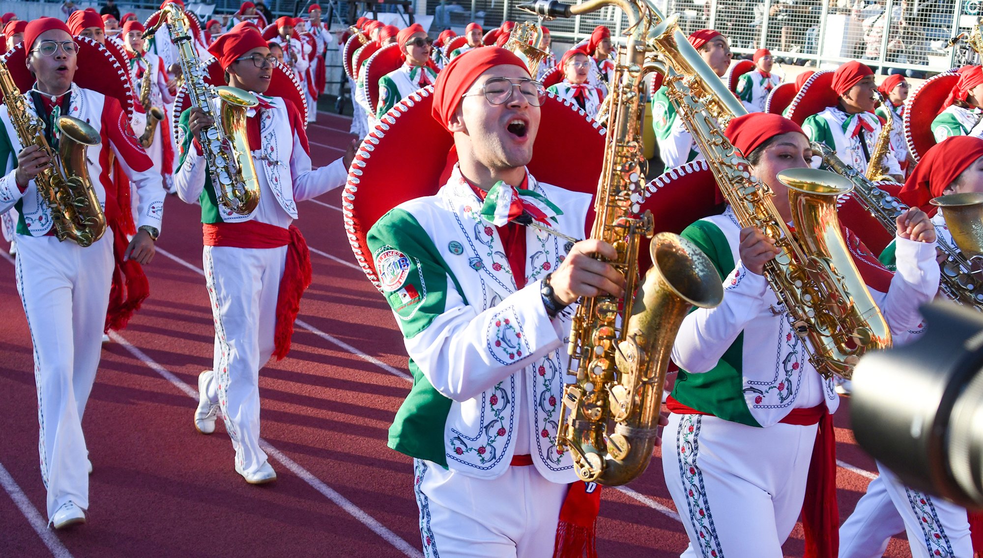 PAS-L-ROSE-BANDFEST-DAY-1-1230_21 The Delfines Marching Band performs during Bandfest, featuring the marching bands that have been chosen for the Rose Parade, at Pasadena City College on Monday December 29, 2025. (Photo by Keith Durflinger, Contributing Photographer)